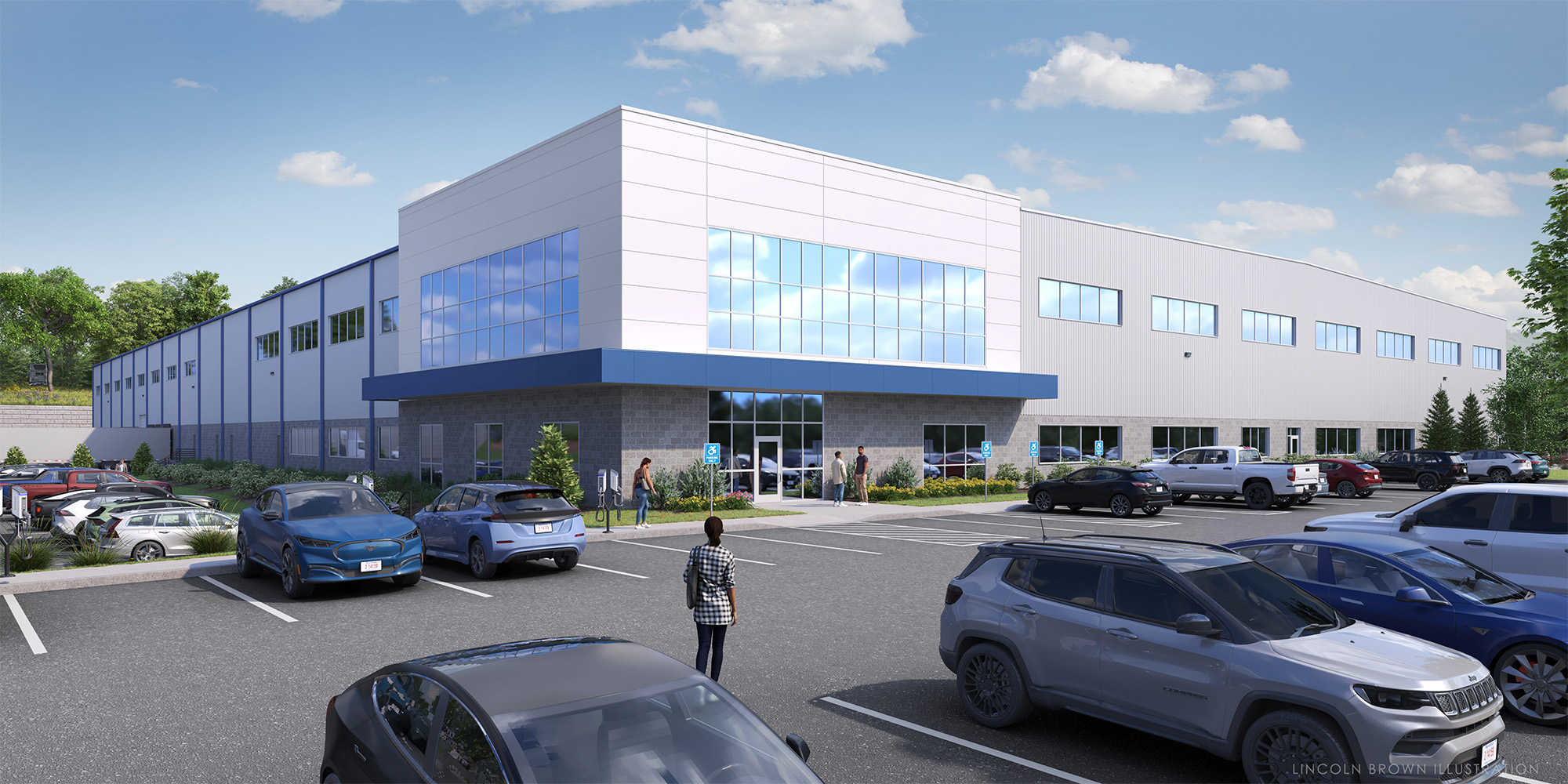 A modern industrial building with large blue-tinted windows, surrounded by a parking lot with several cars. People are walking near the entrance. The sky is clear with a few clouds, and greenery can be seen in the background.